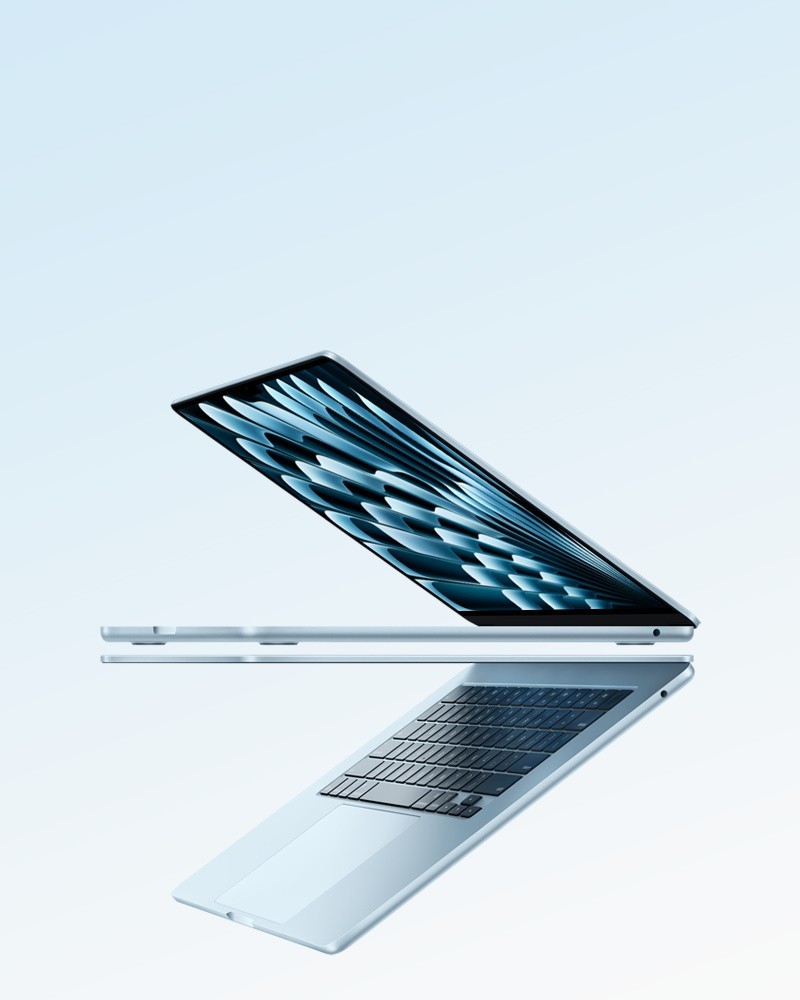 MacBook aberto visto de lado